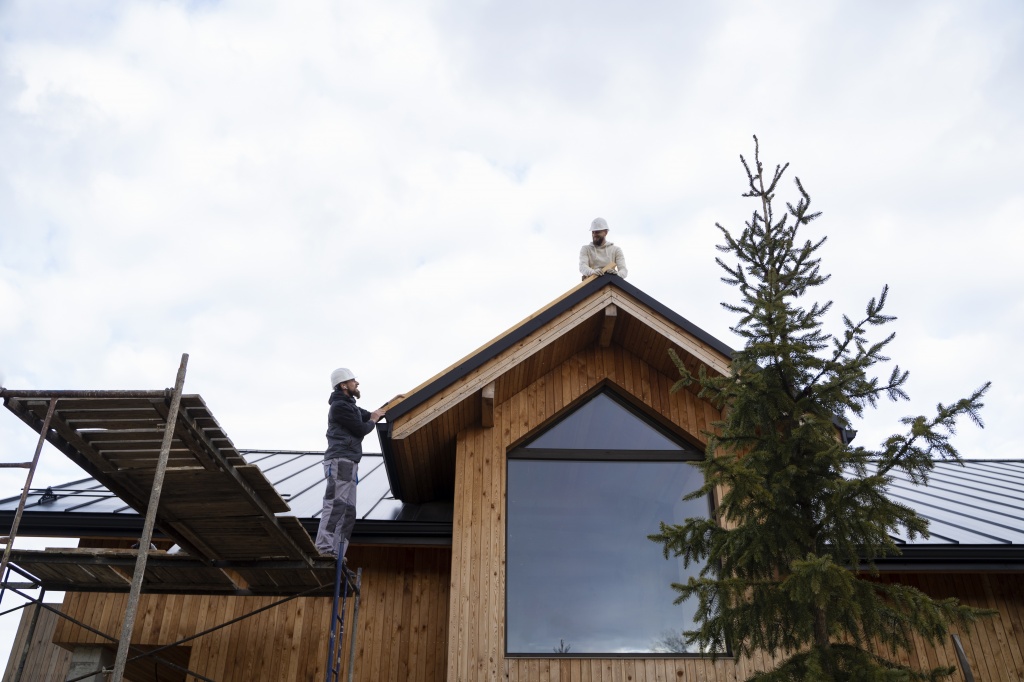 long-shot-men-working-together-roof.jpg